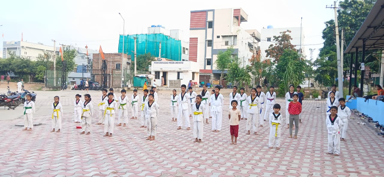 Kids Taekwondo training at the Pedda Cheruvu ground in Mansoorabad, L.B. Nagar
